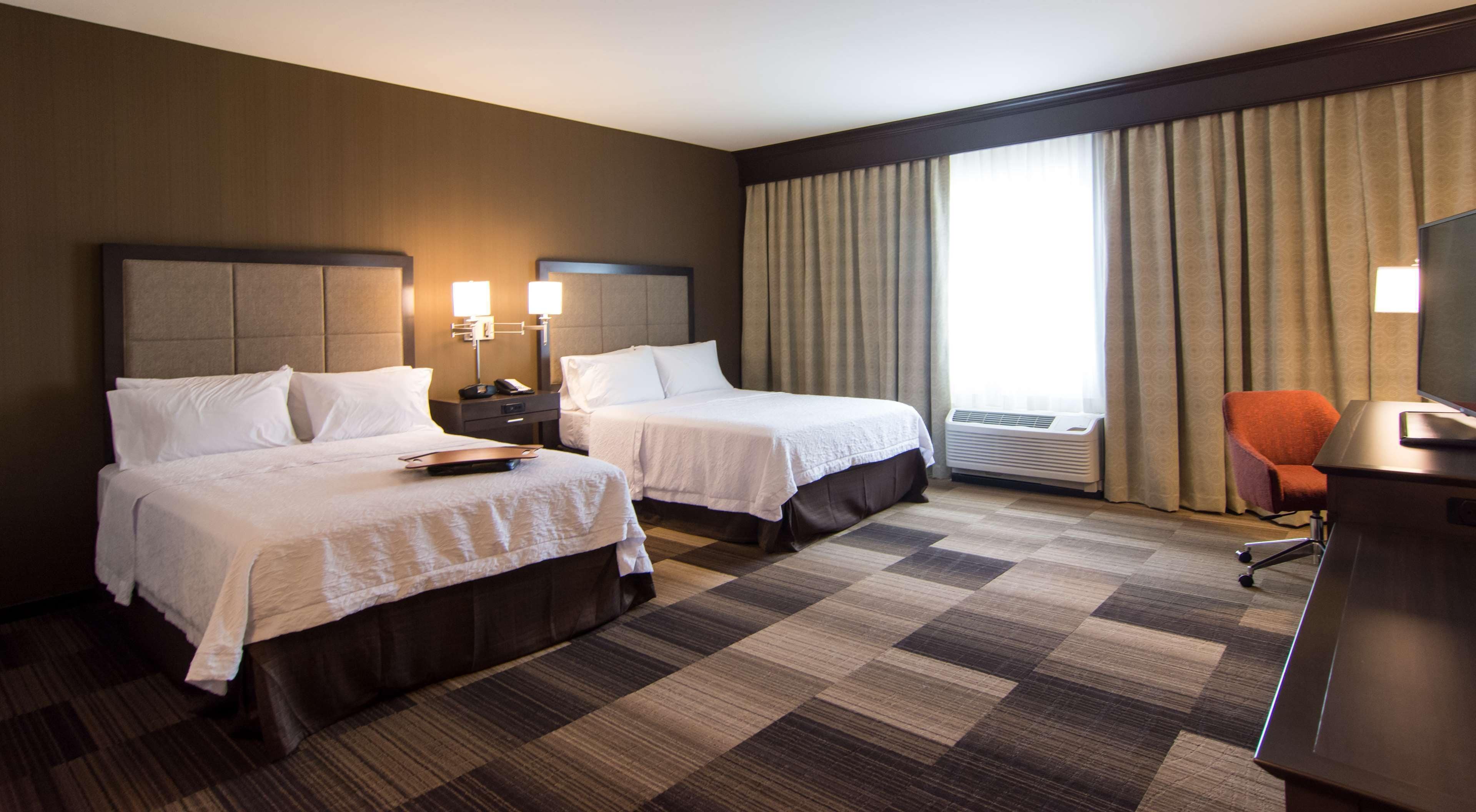 room, 2 queen beds, accessible, non smoking | in-room safe, iron/ironing board, cots/infant beds, wifi