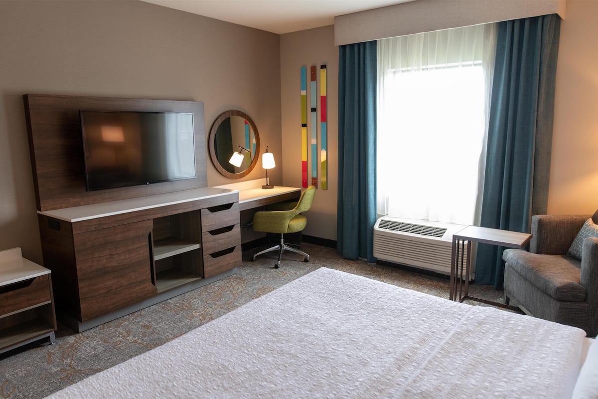 Room, 1 King Bed, Accessible, Non Smoking | Living area | 42-inch LCD TV with cable channels, TV, pay movies