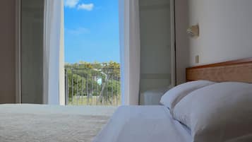 Standard Quadruple Room | Premium bedding, in-room safe, desk, free WiFi