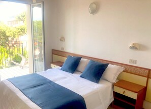 Luxe beddengoed, een kluis op de kamer, een bureau, gratis wifi