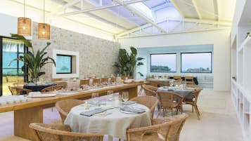 Breakfast, lunch, dinner served; local cuisine, garden views