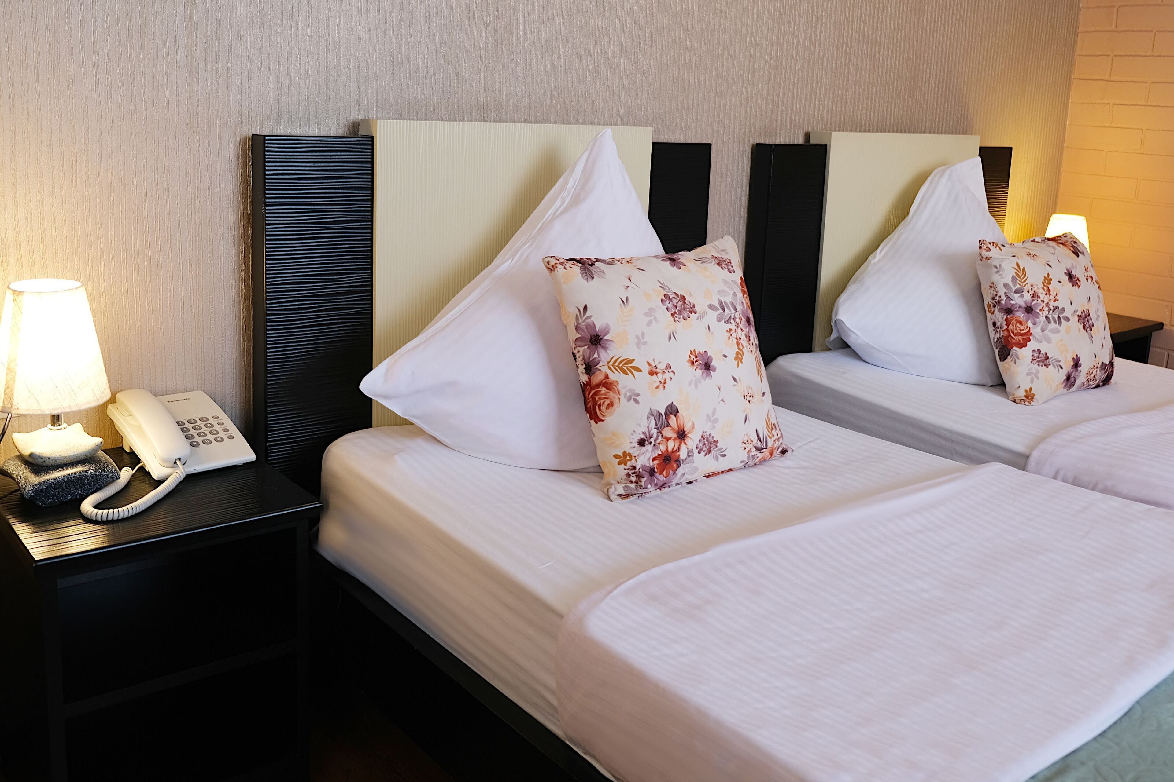 family room | frette italian sheets, premium bedding, memory-foam beds, in-room safe