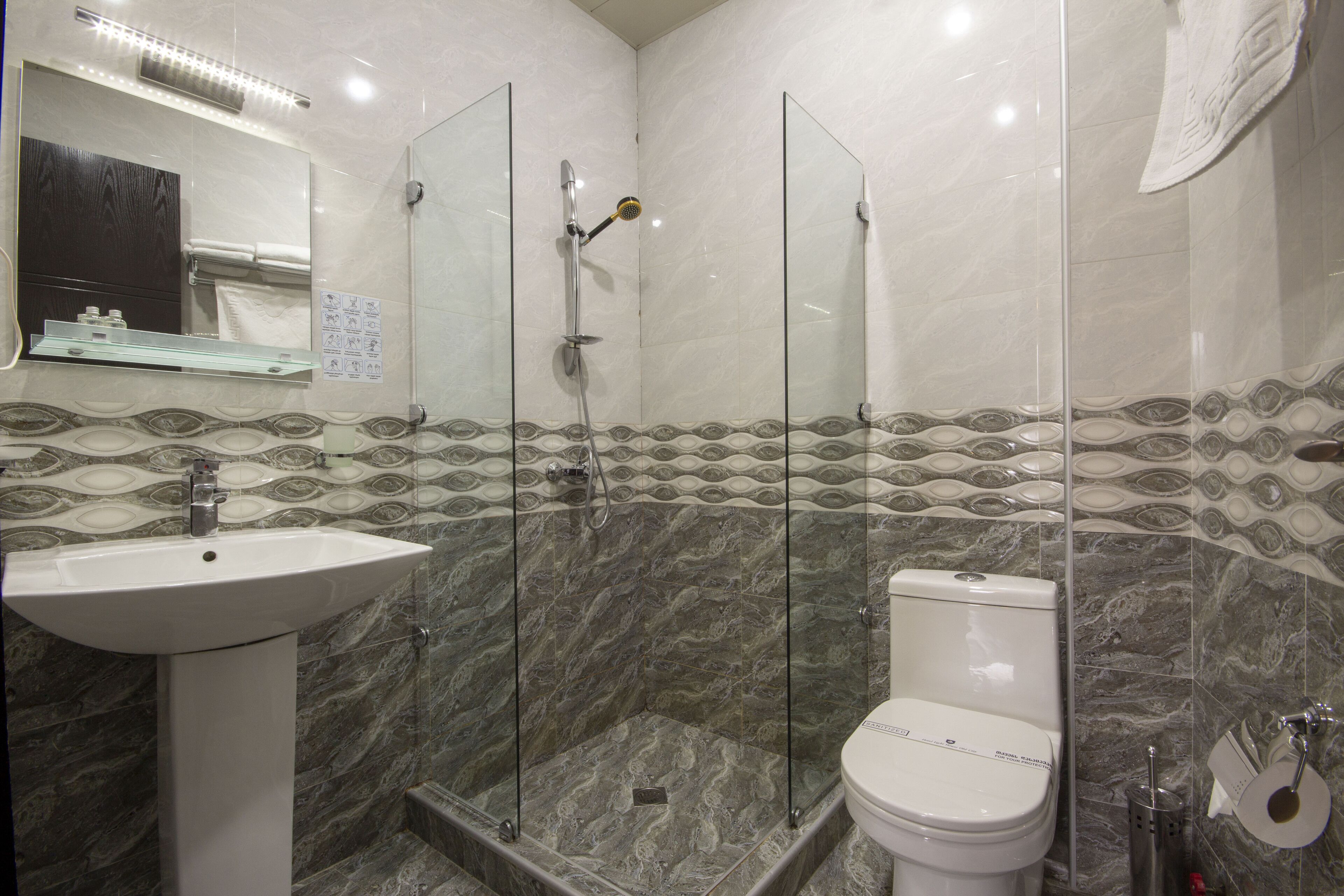 deep-soaking bathtub, free toiletries, hair dryer, bathrobes