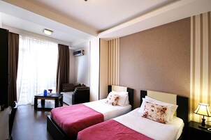 Habitación Confort con 1 cama doble o 2 individuales | Sábanas italianas Frette y ropa de cama de alta calidad