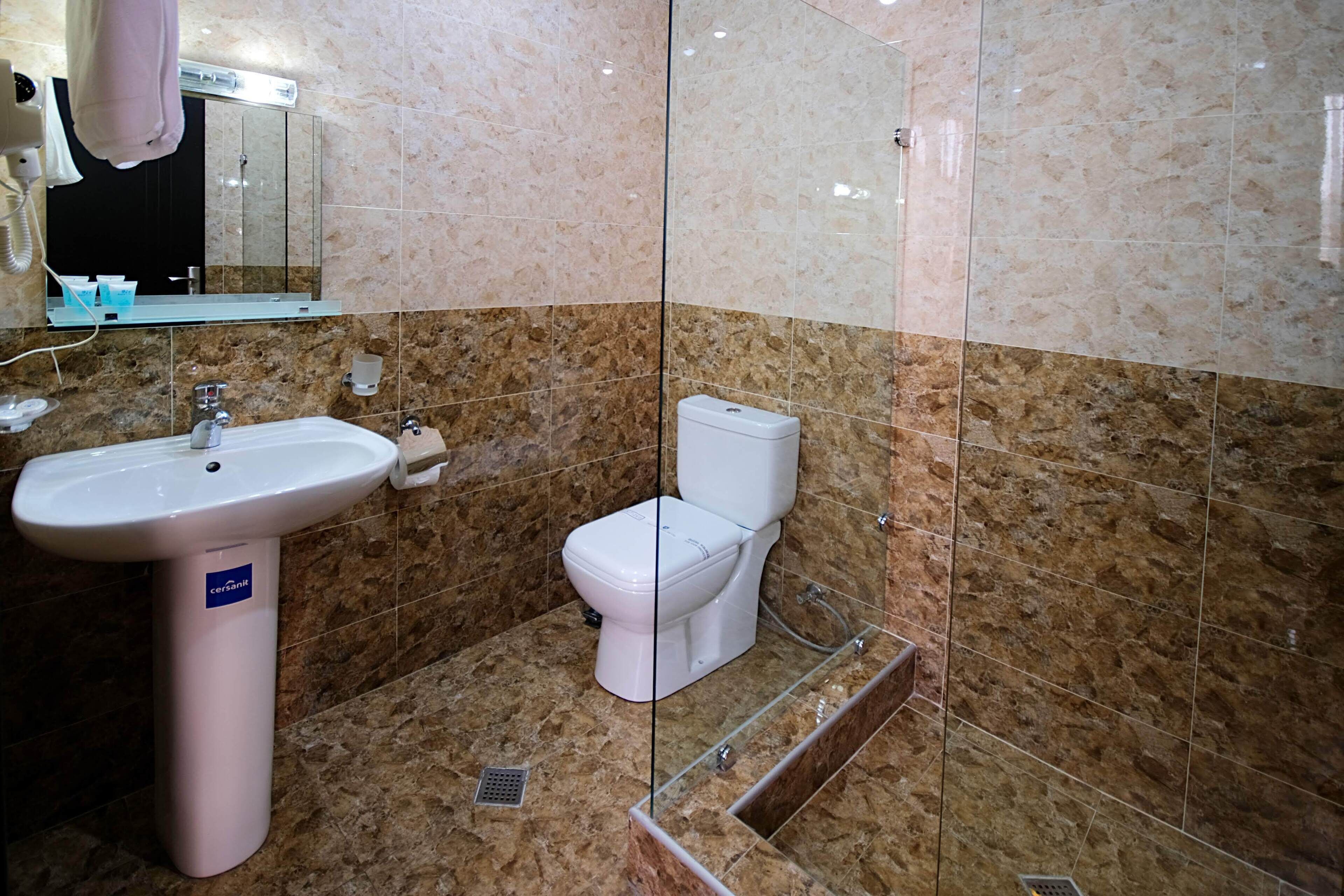 superior junior suite  | bathroom | deep-soaking bathtub, free toiletries, hair dryer, bathrobes