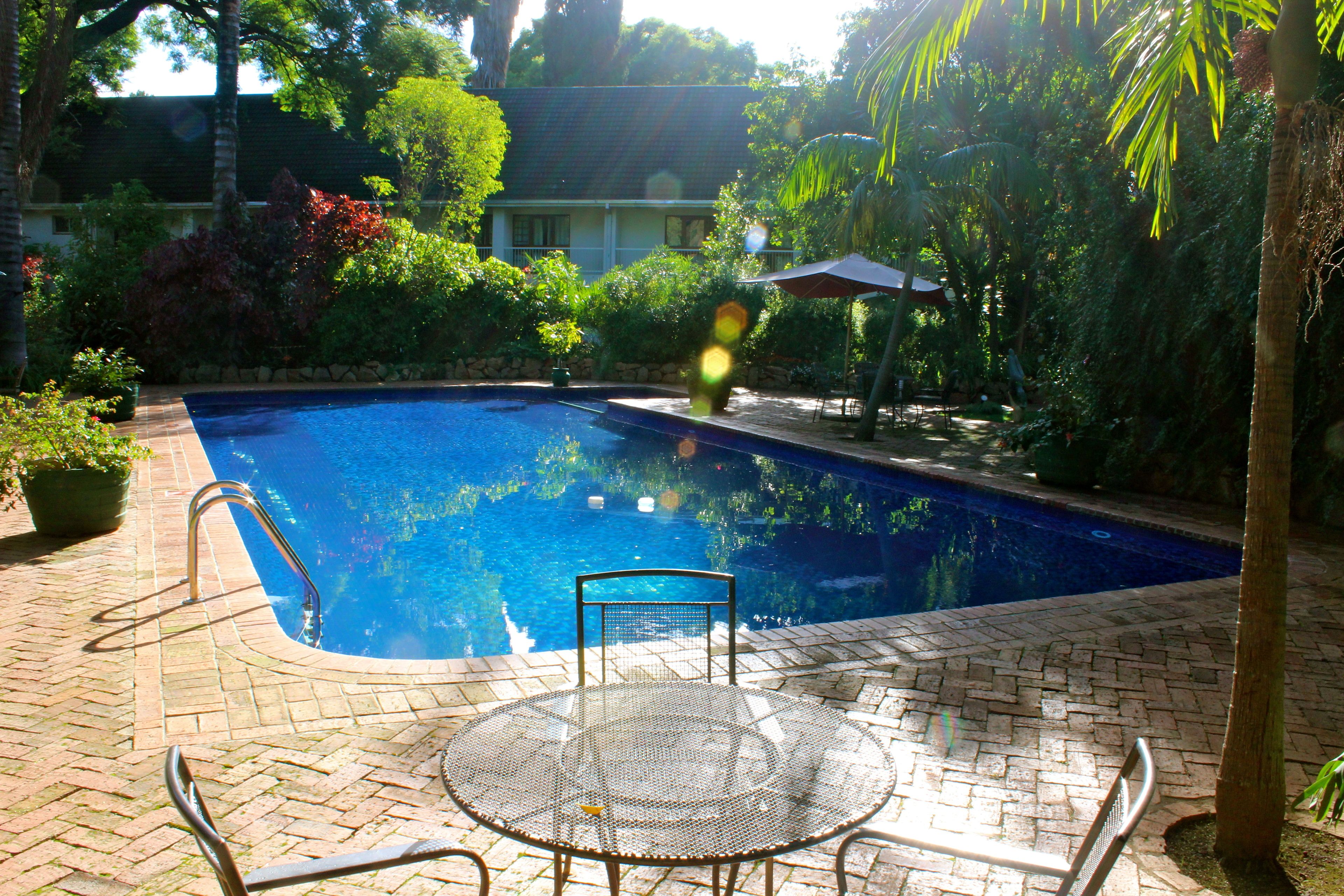 2 outdoor pools, pool umbrellas, pool loungers