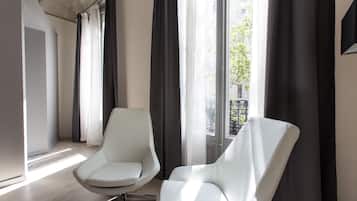 Deluxe Room, Balcony, City View | In-room safe, soundproofing, iron/ironing board, cribs/infant beds