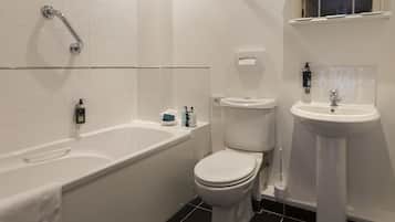 Combined shower/bathtub, hair dryer, towels, shampoo
