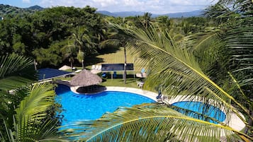 Outdoor pool, pool umbrellas, sun loungers