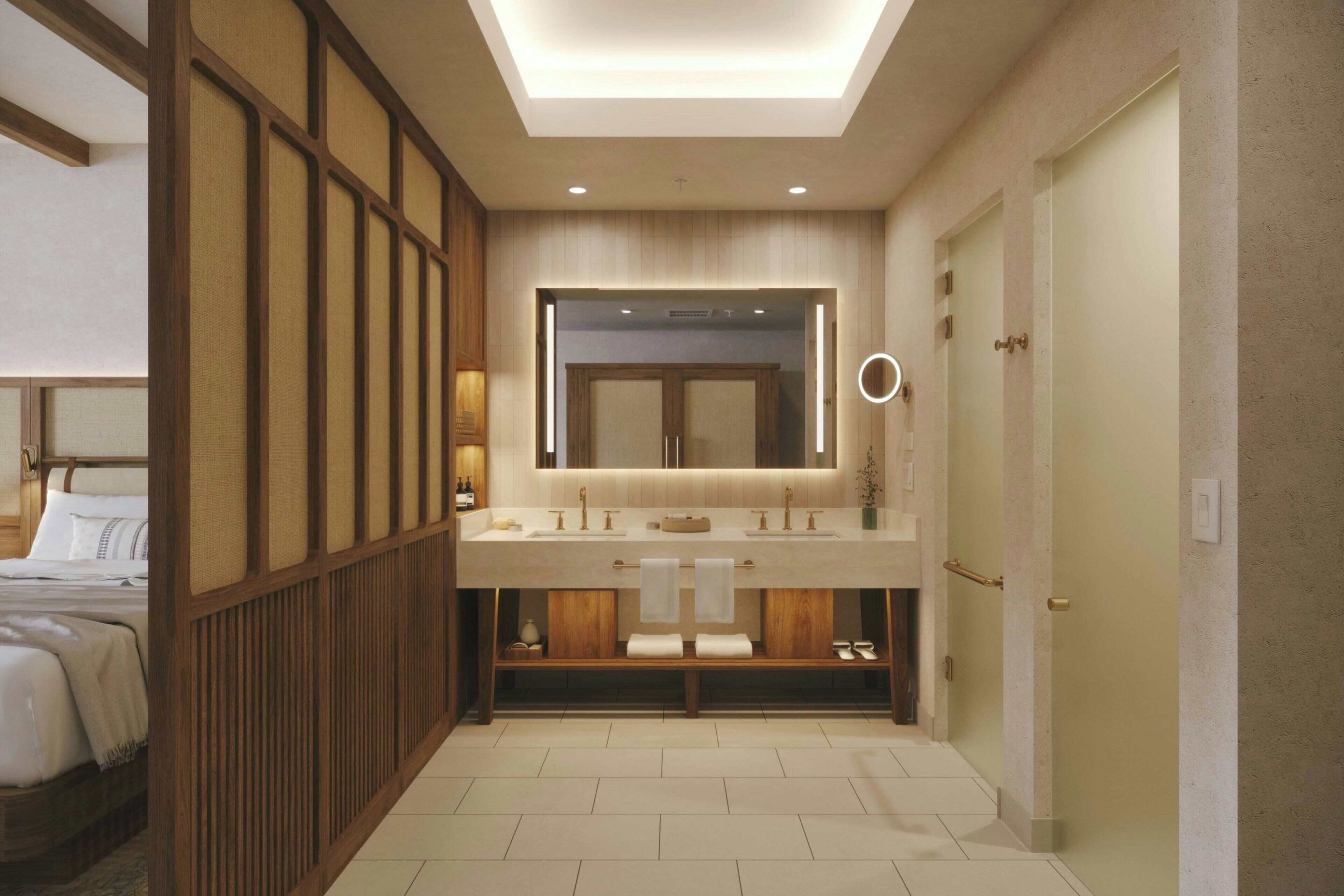 Une salle de bain moderne avec un grand miroir, un lambris en bois et une lucarne.