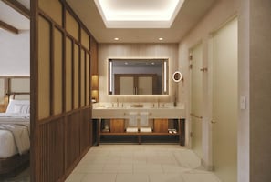 A modern bathroom with a large mirror, wooden paneling, and a built-in sink.