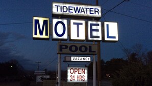 A motel sign with "Tidewater Motel" and "Pool" indicating amenities. - Tidewater Motel (Hayes)