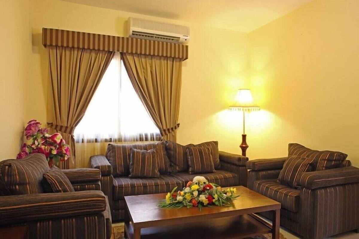 Suite, 1 Bedroom | Living area | LCD TV