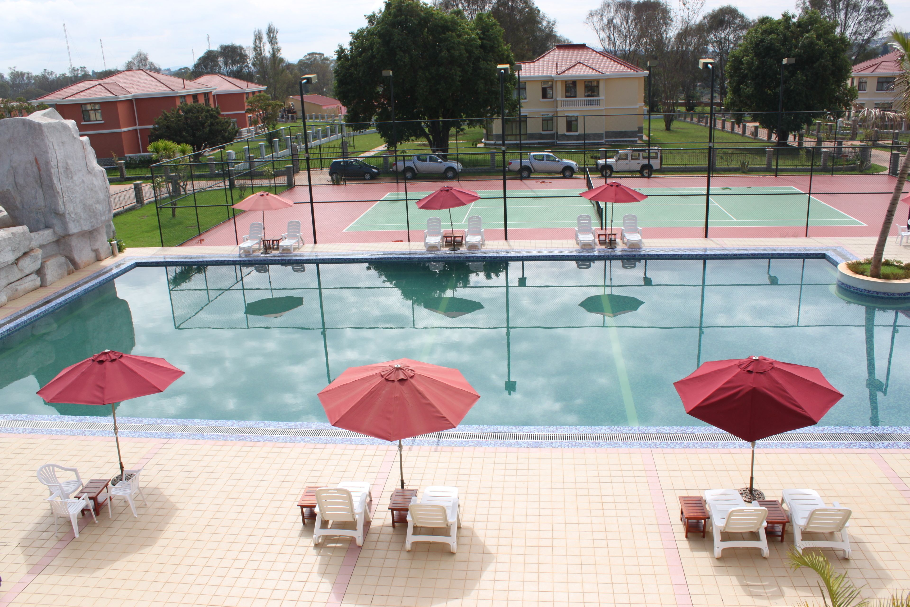 outdoor pool, pool umbrellas, pool loungers