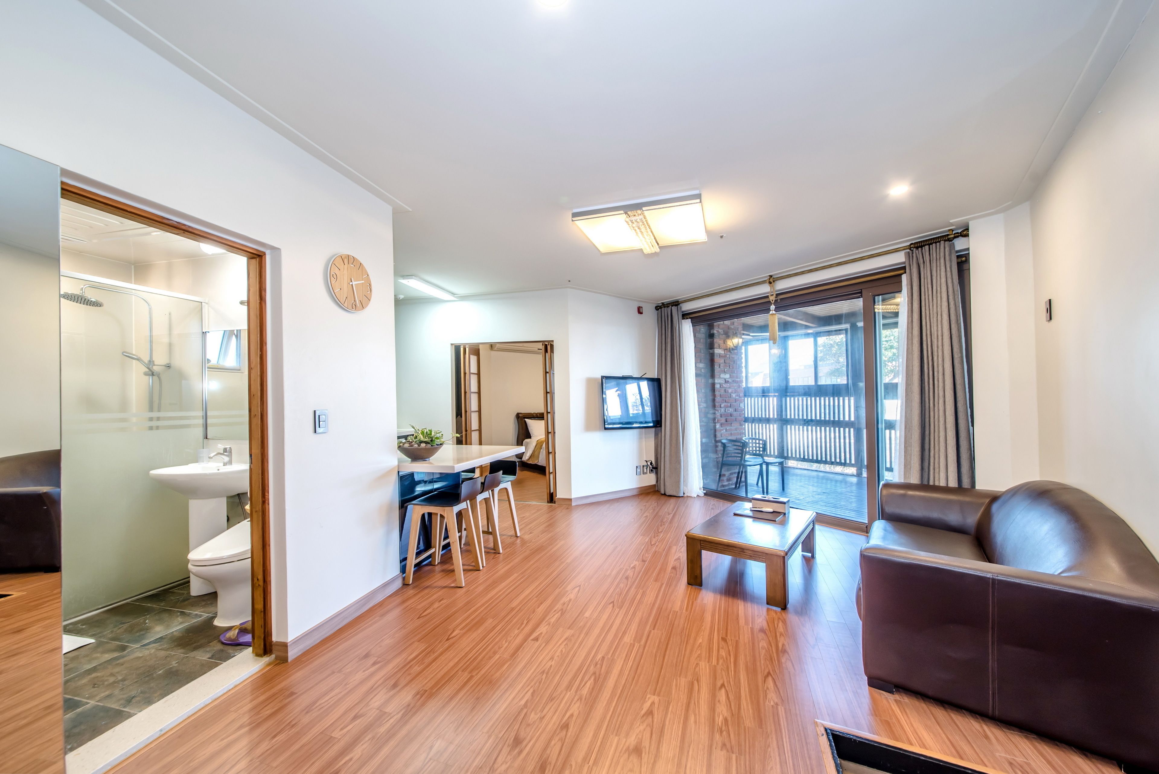 suite, 2 bedrooms, kitchen, ocean view | living room | 50-inch flat-screen tv with digital channels, tv, heated floors