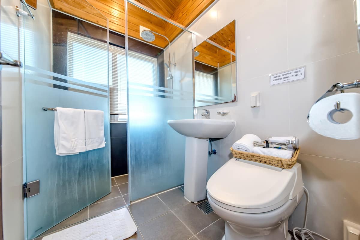 suite, 2 bedrooms, kitchen, ocean view | bathroom | free toiletries, hair dryer, slippers, towels