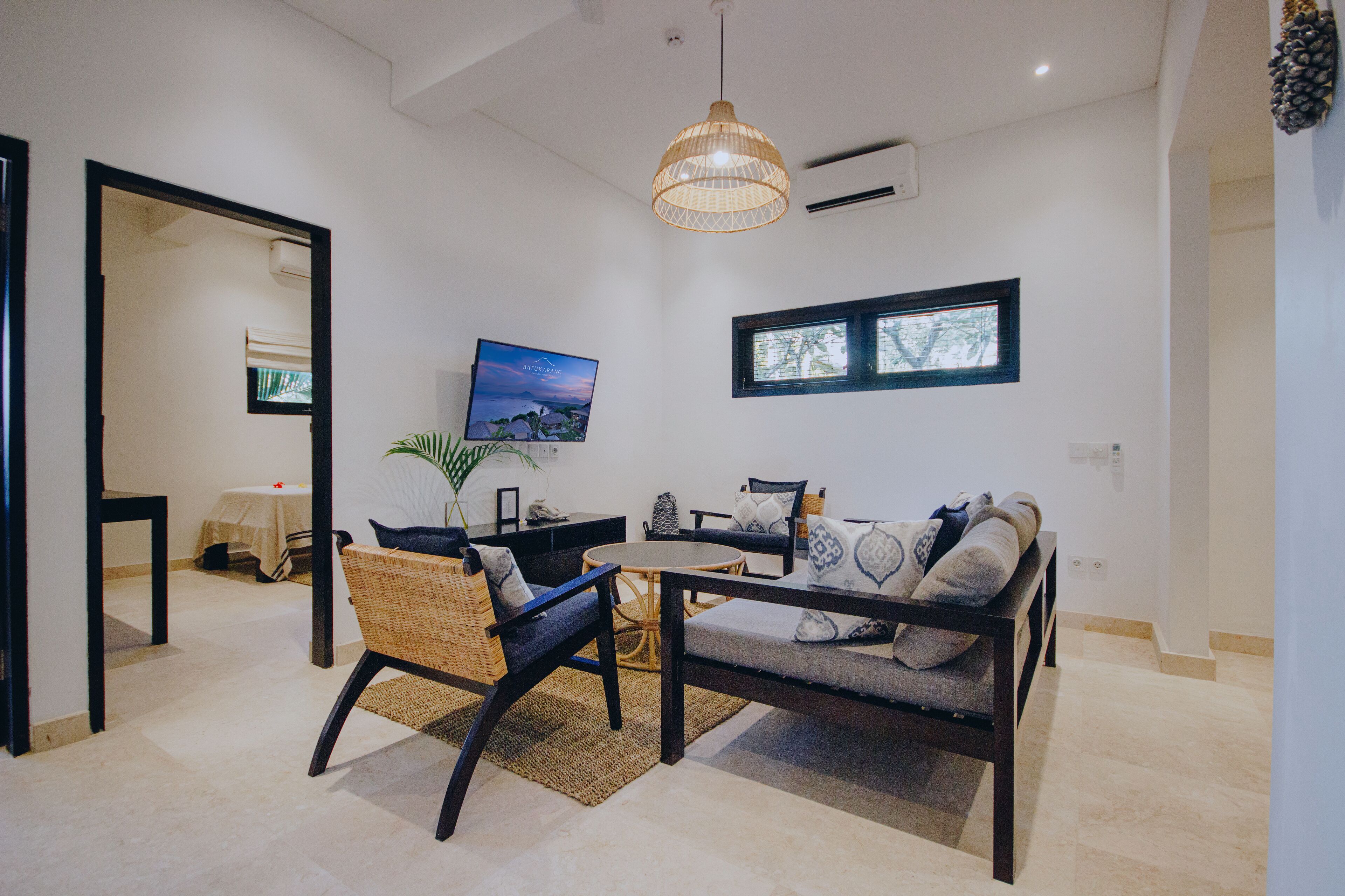 two bedroom apartment | living area | lcd tv