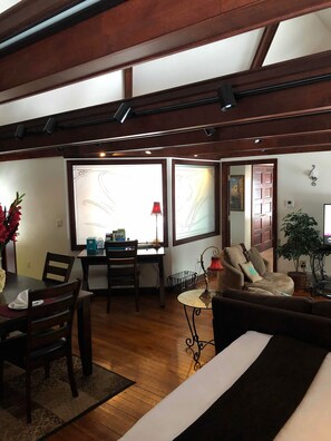 The Carriage House (King Spa Suite) | Living area | TV, pay movies - WC Lipe Mansion (Syracuse)