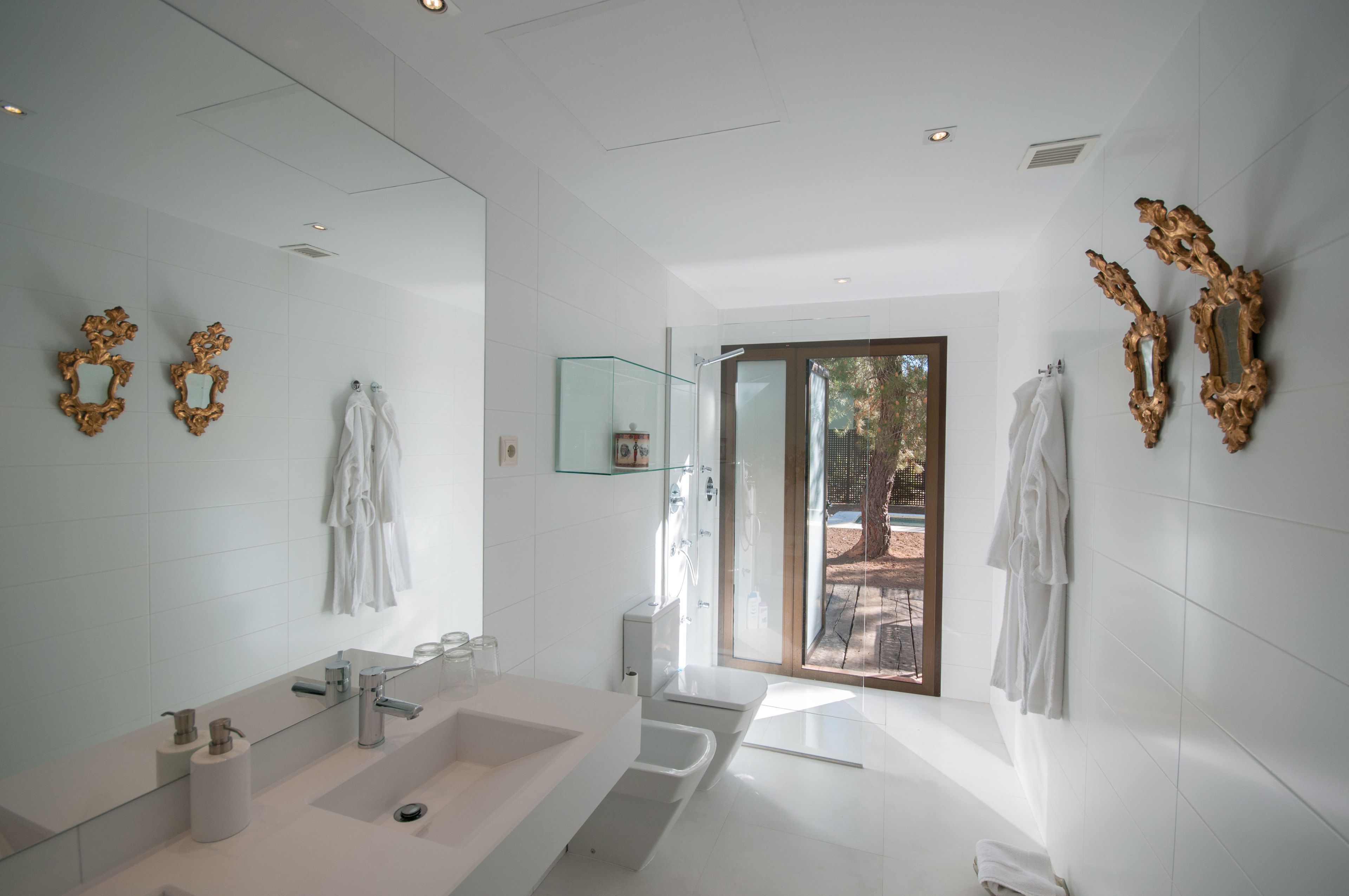 hair dryer, bathrobes, towels