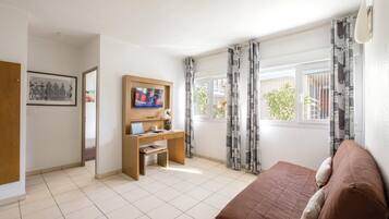 Desk, soundproofing, iron/ironing board, free cribs/infant beds