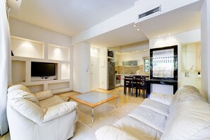 Apartment, 2 Bedrooms, Balcony (Smolenskin 1) | Living area | LCD TV - Tel-Aviving Apartments (Tel Aviv)