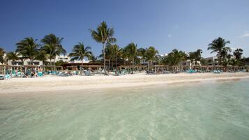 Private beach, white sand, beach towels, scuba diving