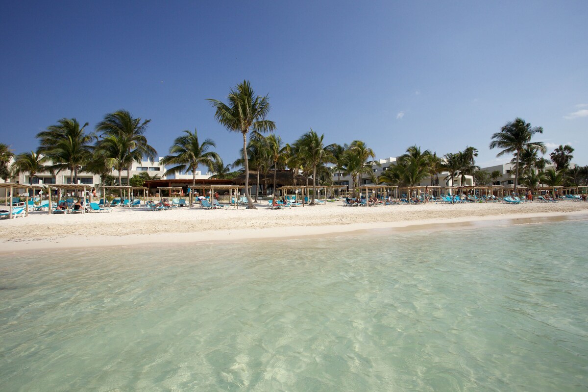 Akumal Bay Beach & Wellness Resort sun loungers on the beach