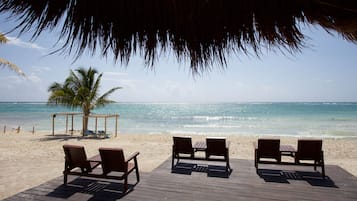 Private beach, white sand, beach towels, scuba diving