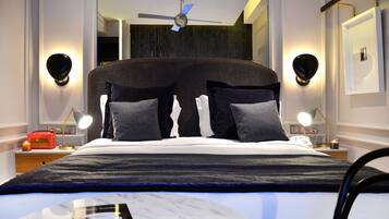 Small Room With Street View | Minibar, in-room safe, individually decorated, individually furnished