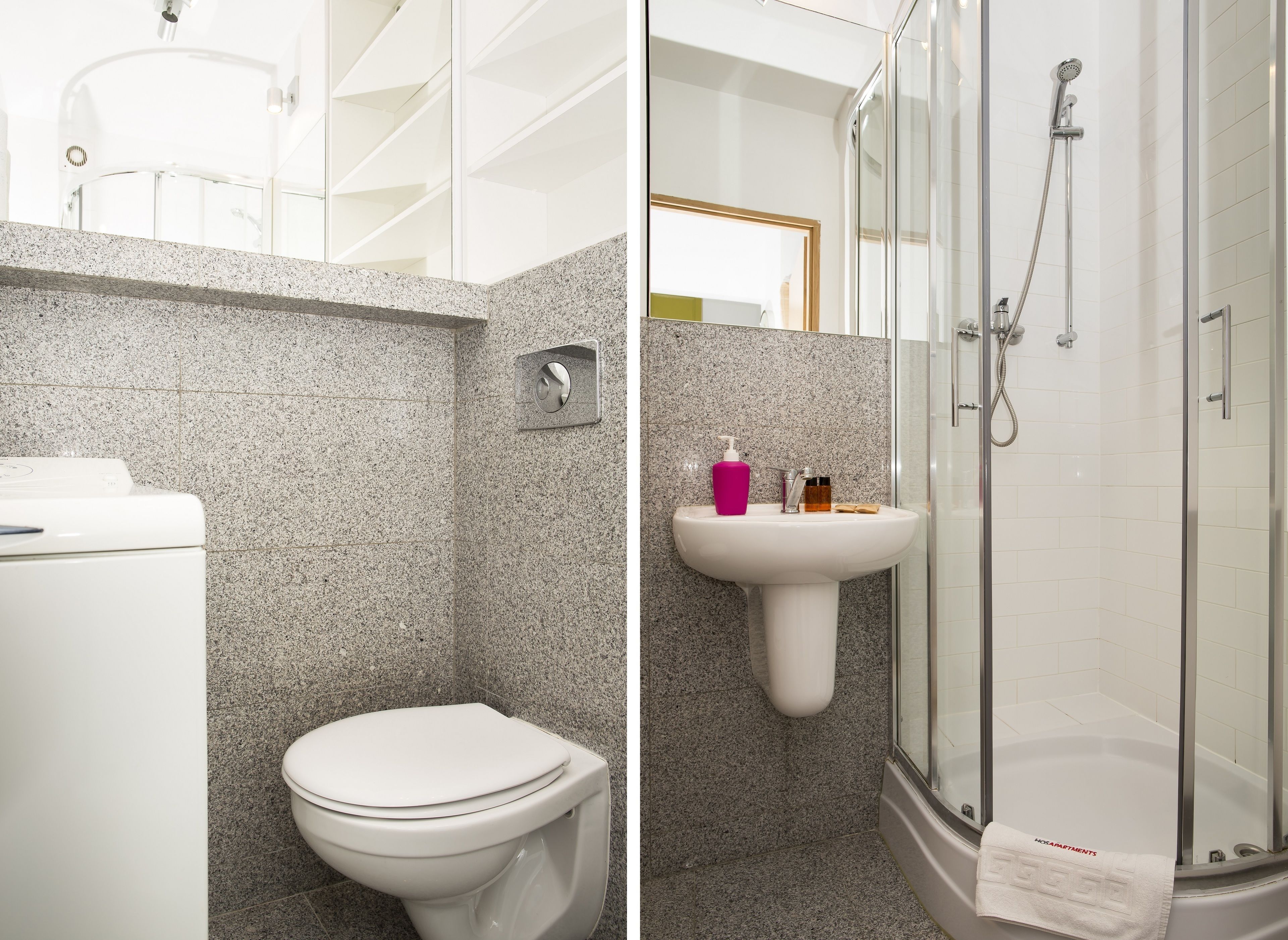 A bathroom with a toilet, sink, and shower.