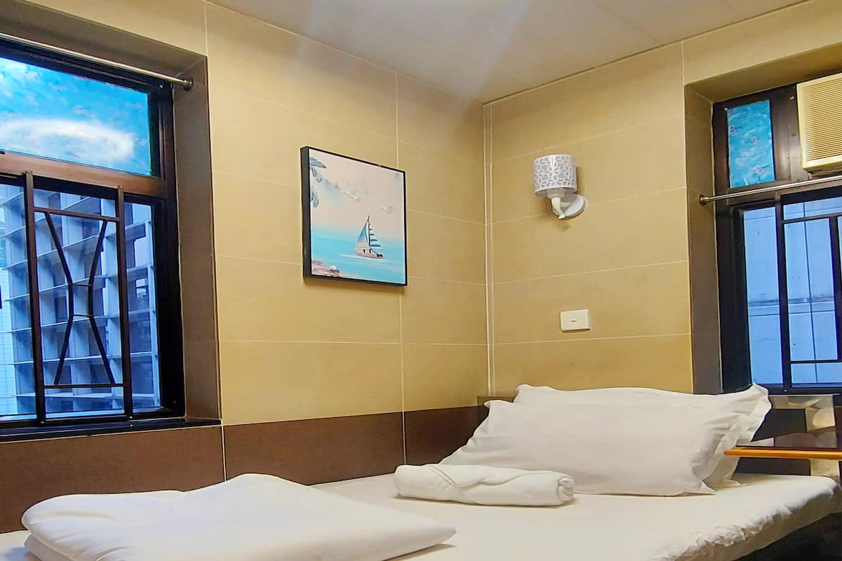 Habitación individual Deluxe, 1 cama individual, baño privado | Tabla de planchar con plancha, wifi gratis, ropa de cama