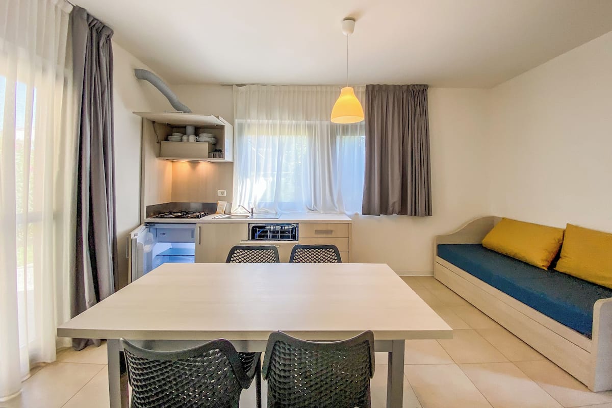 Basic Apartment, 2 Bedrooms (Easy 1° Floor) | Living area | 19-inch flat-screen TV with satellite channels, TV, table tennis