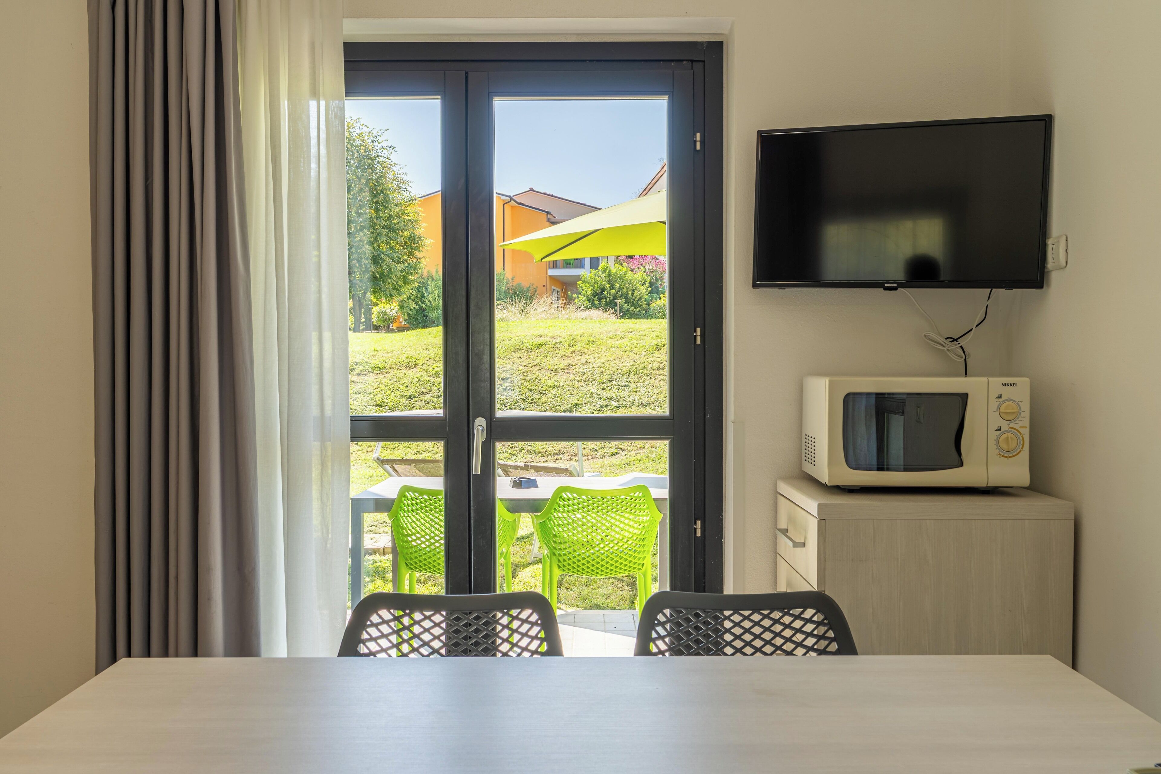 Comfort Apartment, 2 Bedrooms (Ground Floor) | Living area | 19-inch flat-screen TV with satellite channels, TV, table tennis