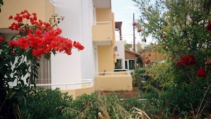 A building with a white facade and balconies. - Dimitra Apartments (Hersonissos)