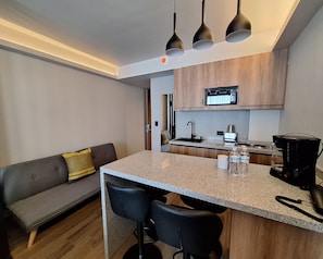 Standard Quadruple Room, 2 Double Beds | In-room safe, desk, soundproofing, iron/ironing board