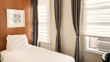 Room, 1 Twin Bed | Premium bedding, down comforters, iron/ironing board, free WiFi