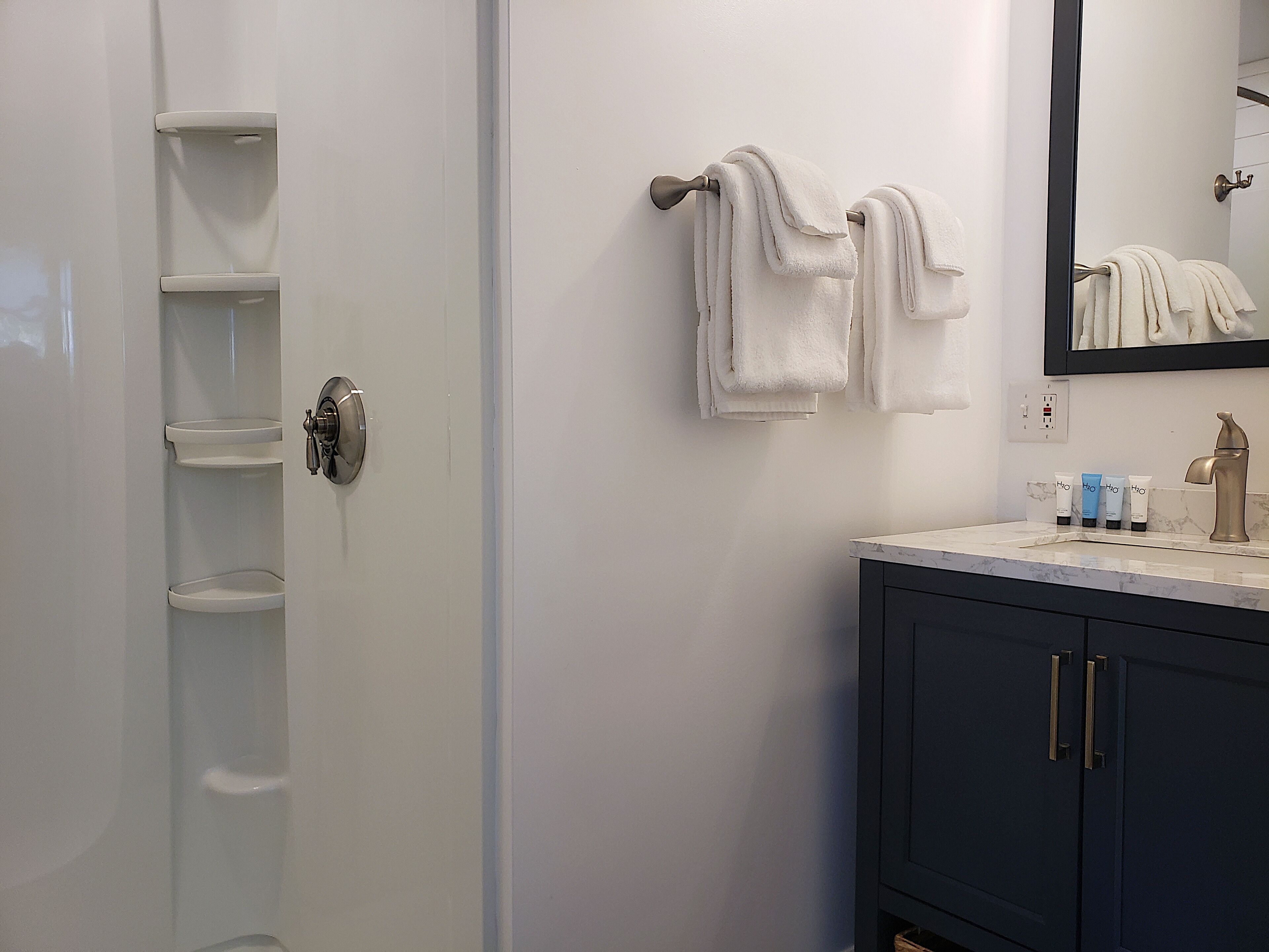 combined shower/bathtub, free toiletries, hair dryer, towels