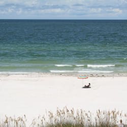 On the beach, white sand, beach shuttle, beach cabanas