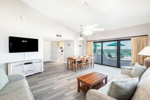 Penthouse 2 bedroom (AS-D) | Living area | 50-inch flat-screen TV with cable channels, TV - All Seasons Vacation Resort by Liberte' (Madeira Beach)