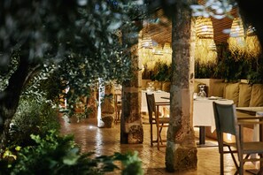 Breakfast, lunch, dinner served; Mediterranean cuisine, garden views