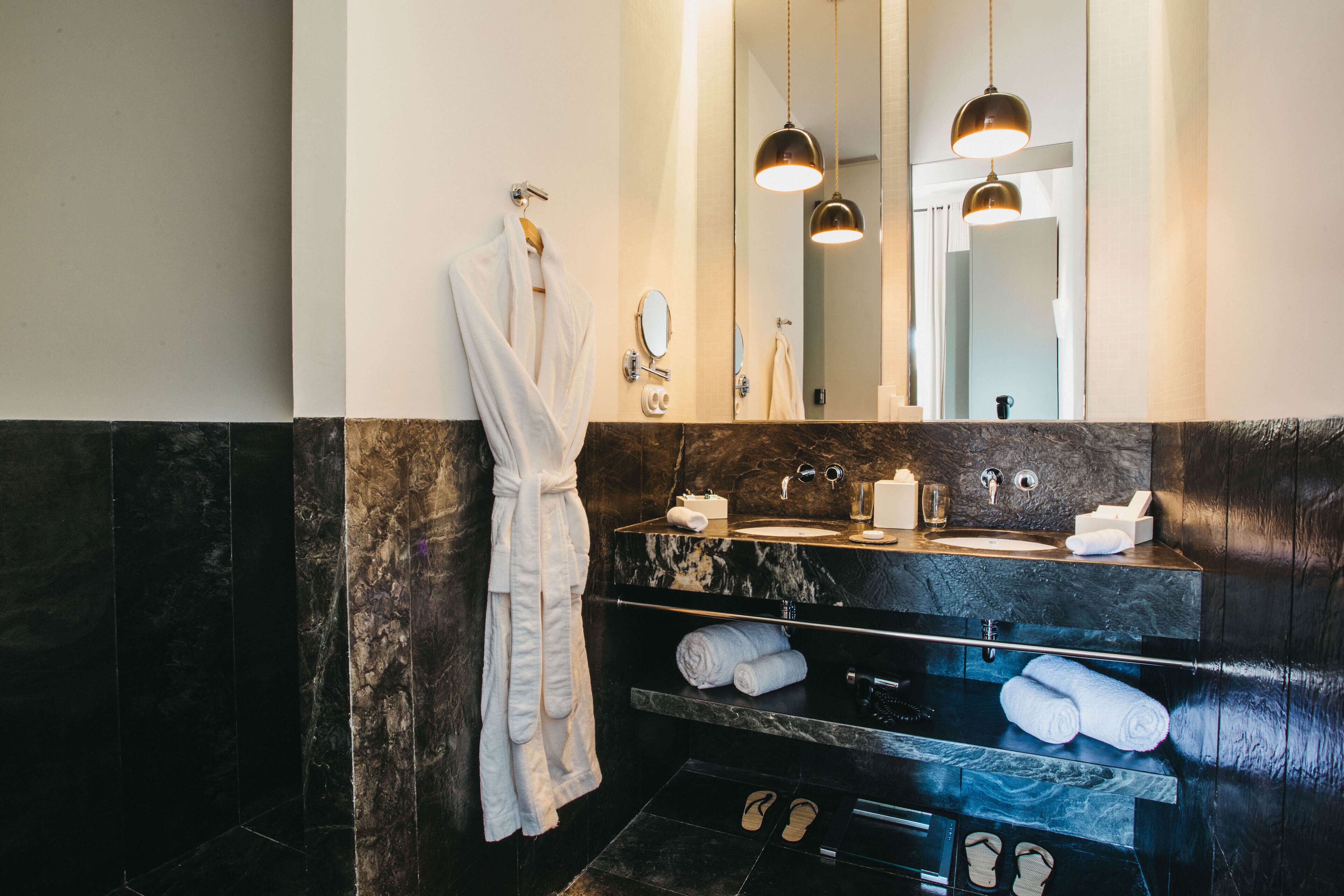 double room | bathroom | designer toiletries, hair dryer, bathrobes, slippers