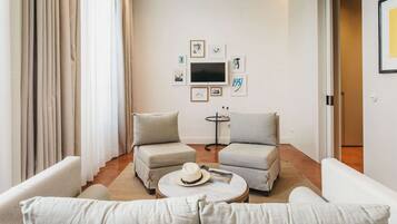 Suite junior | 1 dormitorio, ropa de cama de alta calidad, minibar y caja fuerte