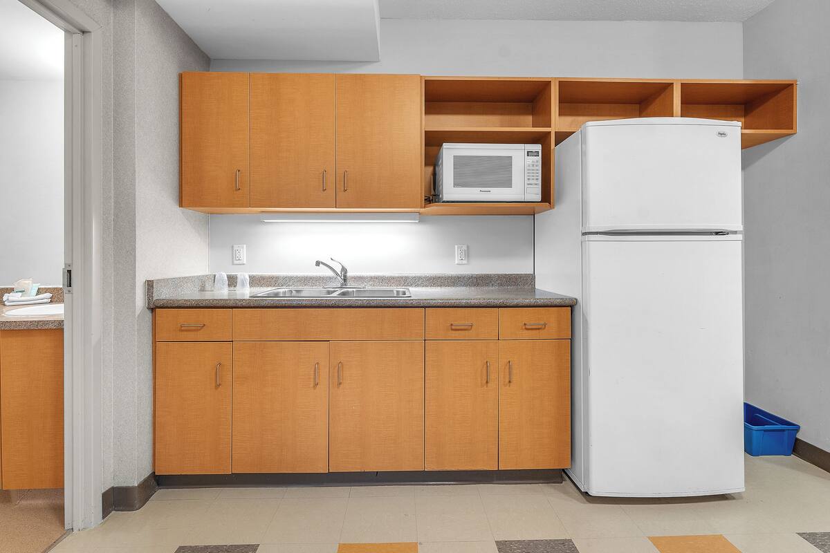 full-sized fridge, microwave, dining tables