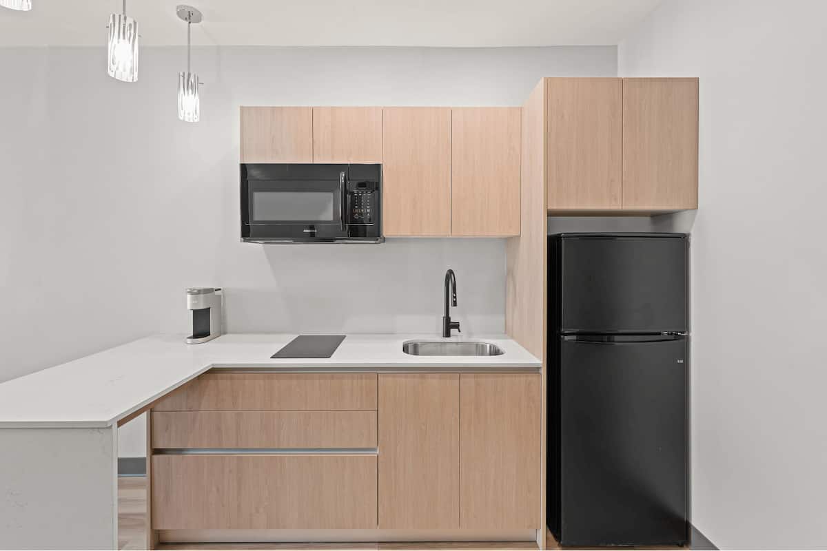 premium bedding, desk, laptop workspace, blackout curtains