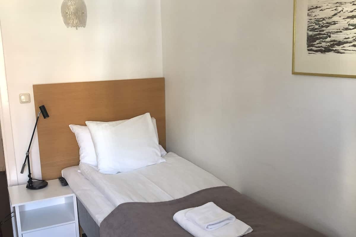Habitación individual | Wifi gratis y ropa de cama