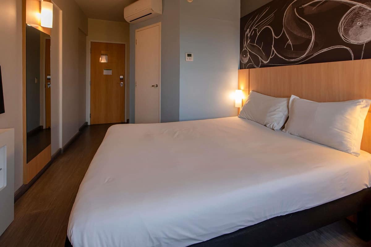 Standard Apartment, 1 Double Bed | Minibar, in-room safe, desk, blackout drapes