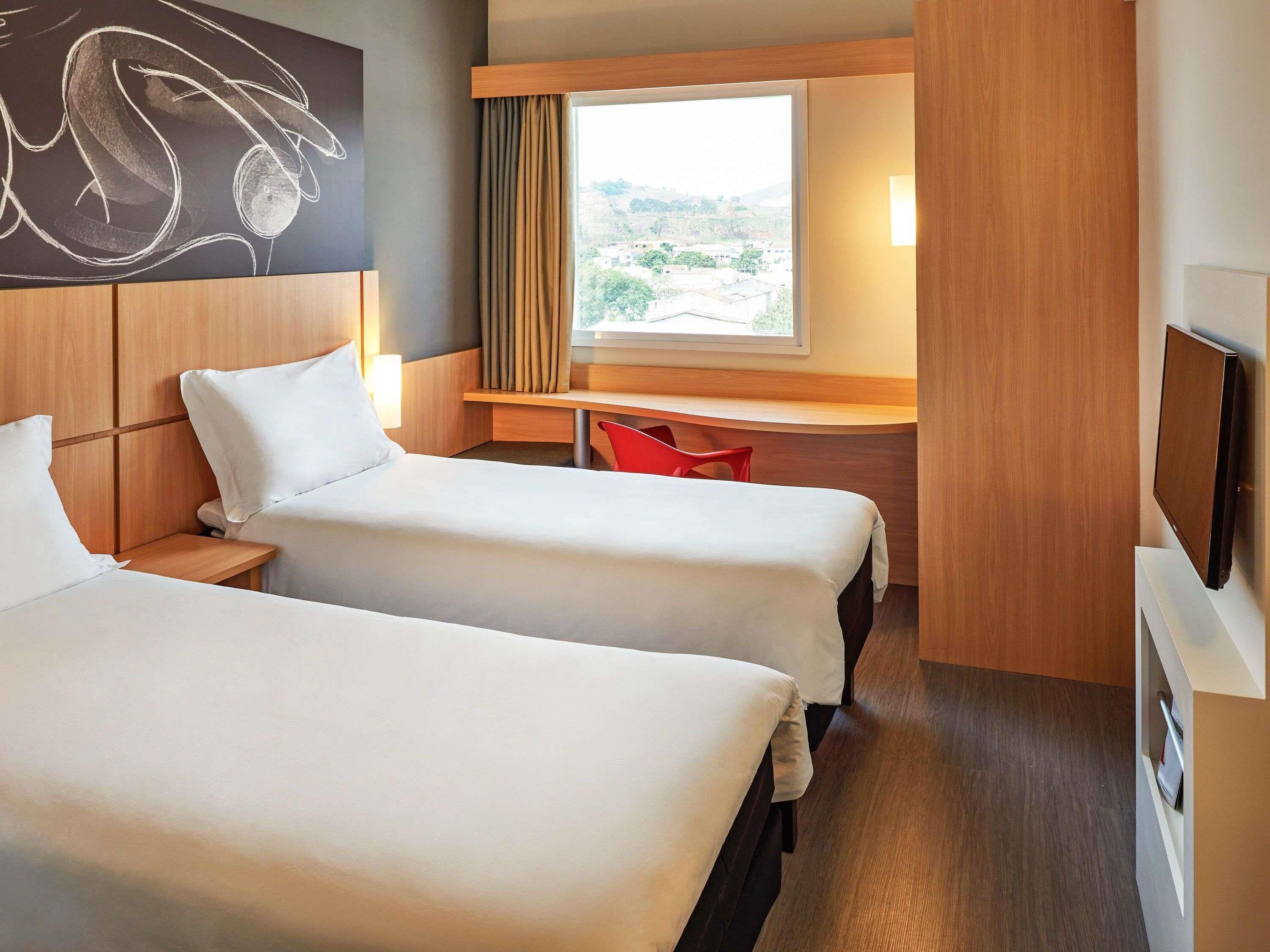 Standard Apartment, 2 Twin Beds | Minibar, in-room safe, desk, blackout drapes