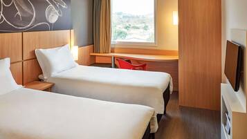 Standard Apartment, 2 Twin Beds | Minibar, in-room safe, desk, blackout drapes