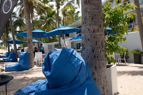 Breakfast, lunch, dinner served; beach views