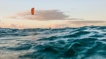 On the beach, sun loungers, beach umbrellas, beach towels